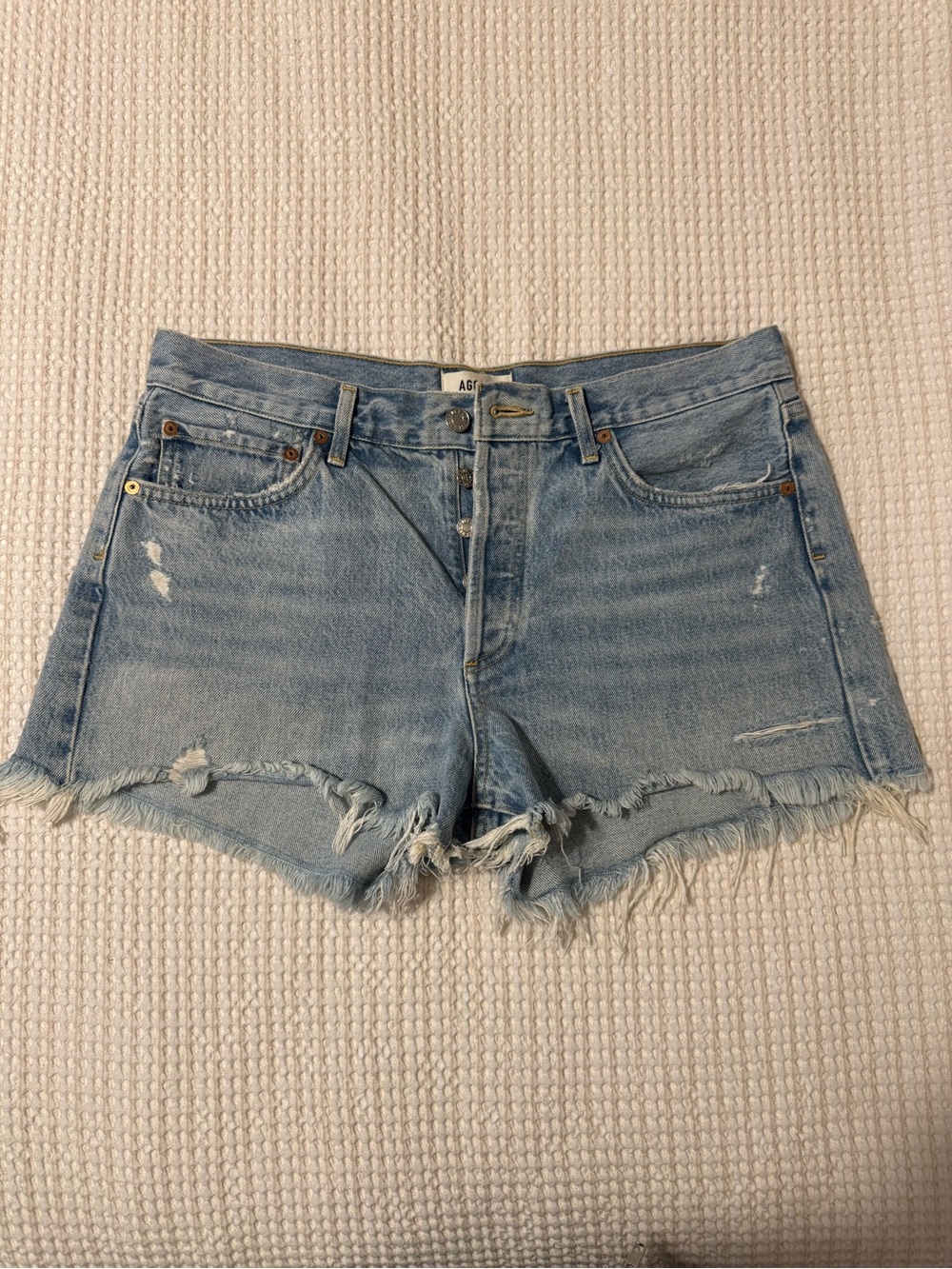 Agolde Light Blue Distressed Denim Cutoff Shorts